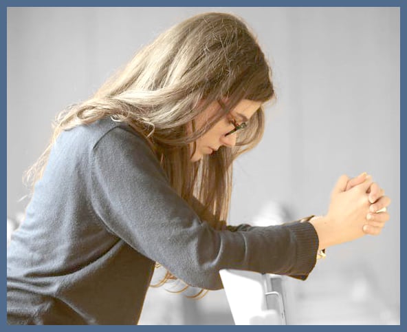Young woman praying