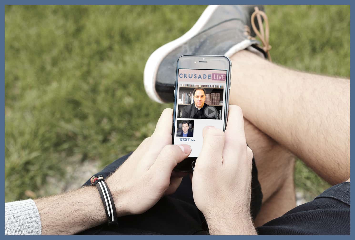 Man holding smartphone watching